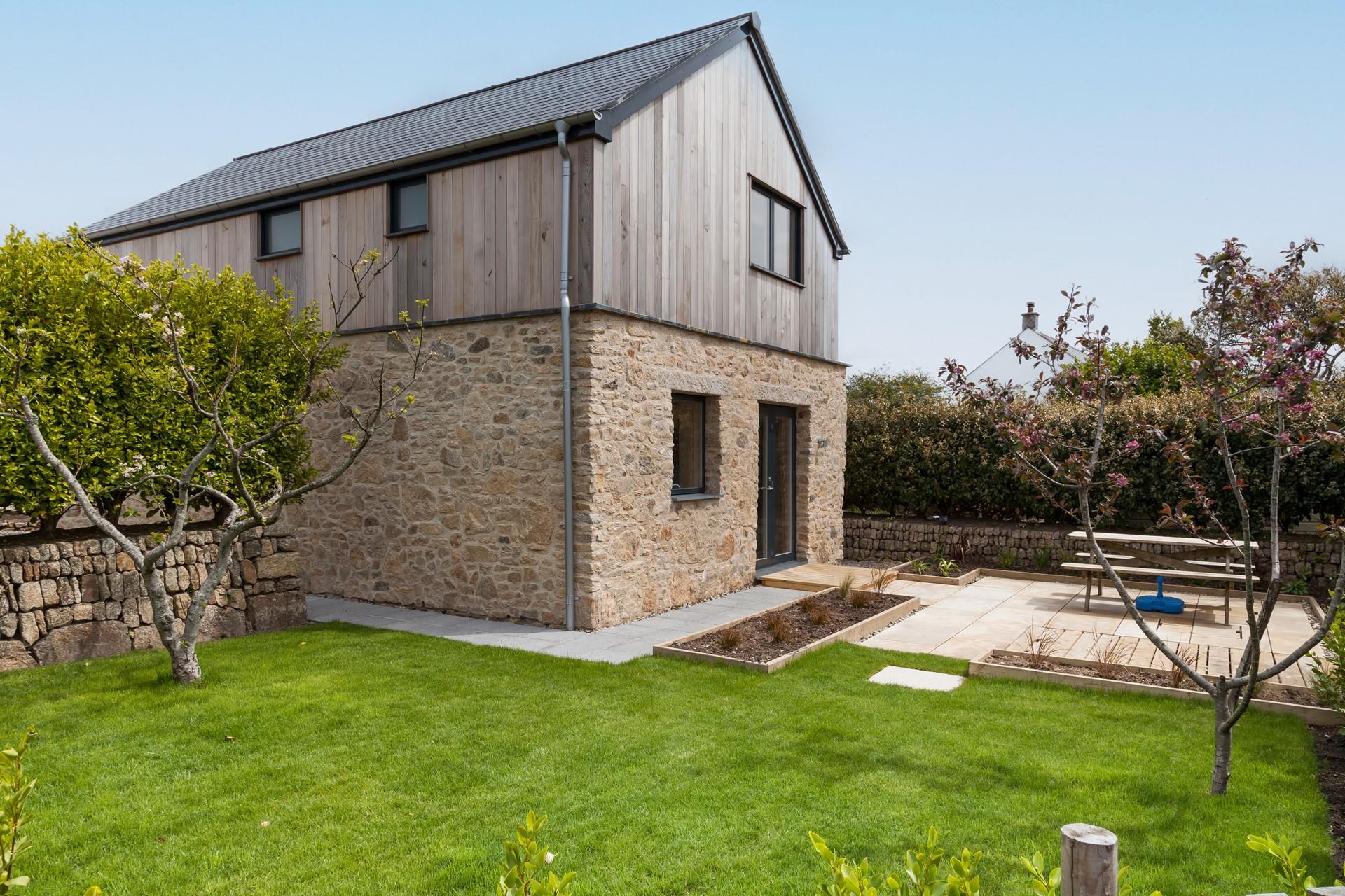 Thoughtfully designed, the garden features a patio area with a picnic bench, and a lawn area, ideal for the kids.