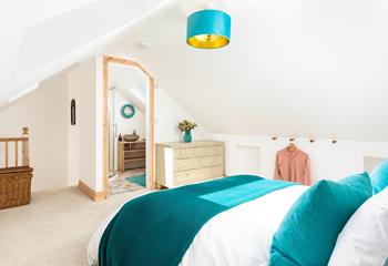 Escape to the top and relax in this light and airy bedroom with en-suite.