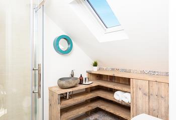 Lots of storage space for lotions and potions in this master en-suite.