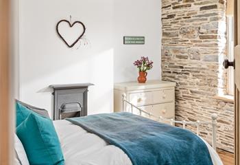 Bedroom 2 is full of character and charm with countryside views.