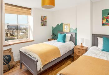 Light streams into this bedroom depicting the colour scheme.