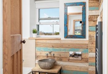 Bathroom with double views. Ocean views from the window and rural views from the mirror.