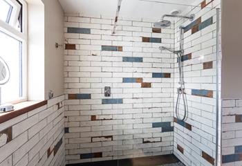 Unusual tiles create an urban and chic vibe in this county home. 
