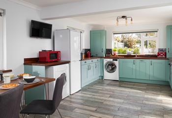 The open plan kitchen/diner is light and spacious, perfect for the whole family. 