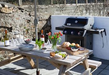 Light the barbeque and enjoy family time in the garden.
