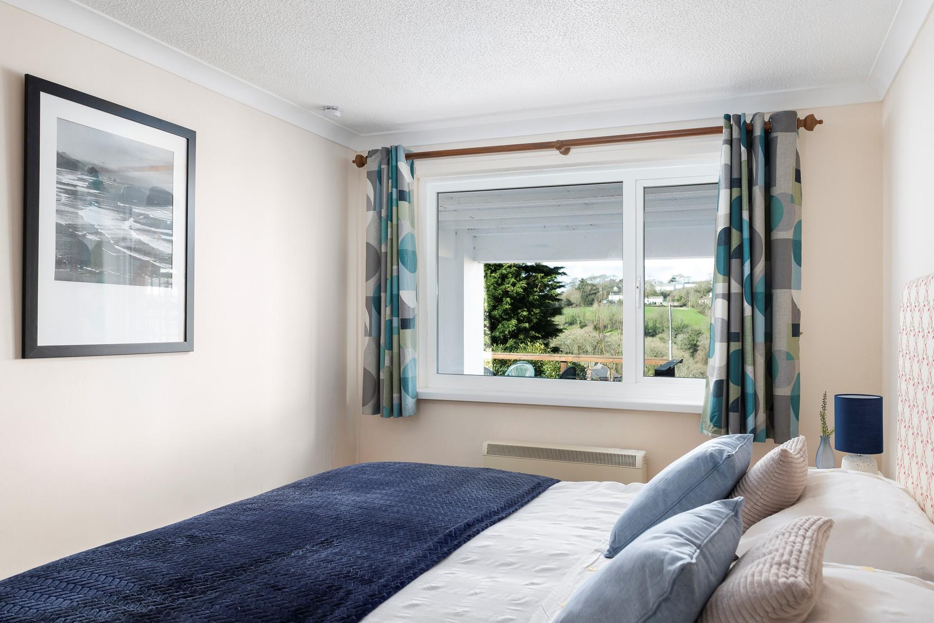 Enjoy a lazy morning in bed, cup of tea in hand, enjoying the leafy views through the window. 