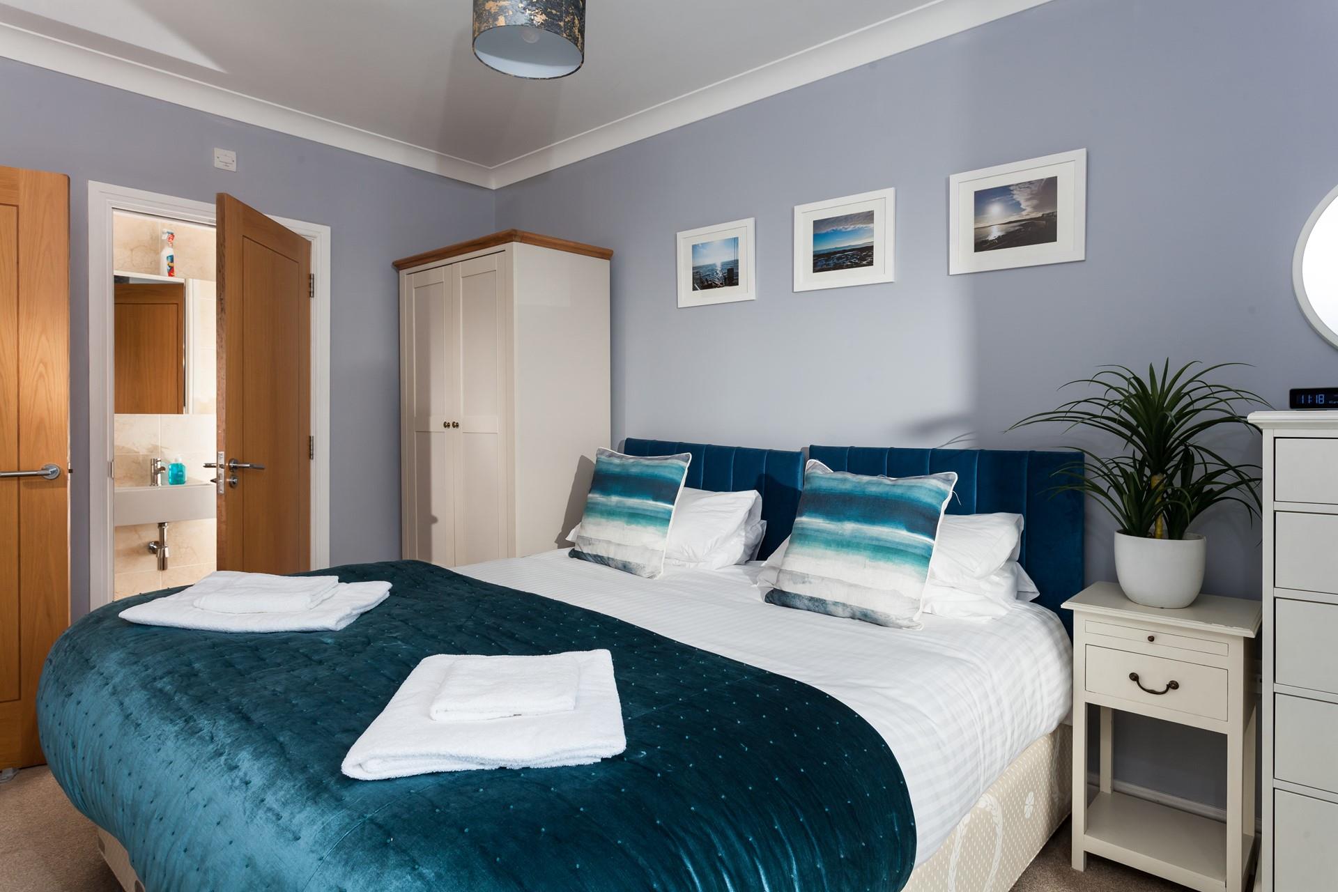 Climb out of bed and get ready in your en suite.