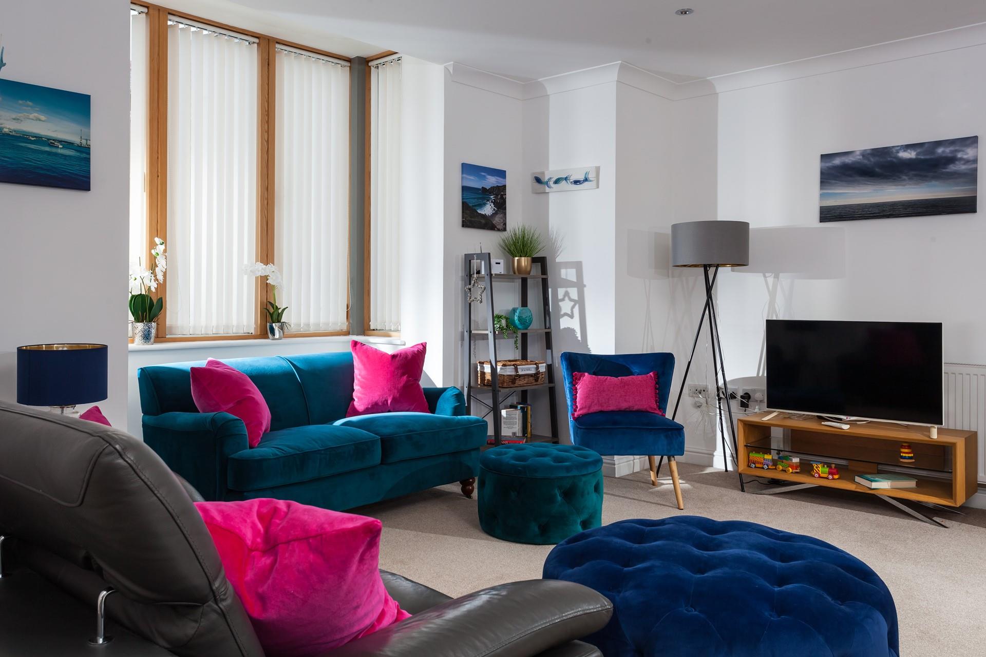 Enjoy a family movie night in the sitting room.