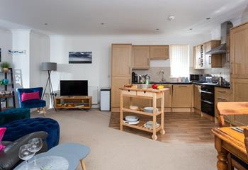 The open plan layout allows you to cook whilst still socialising.