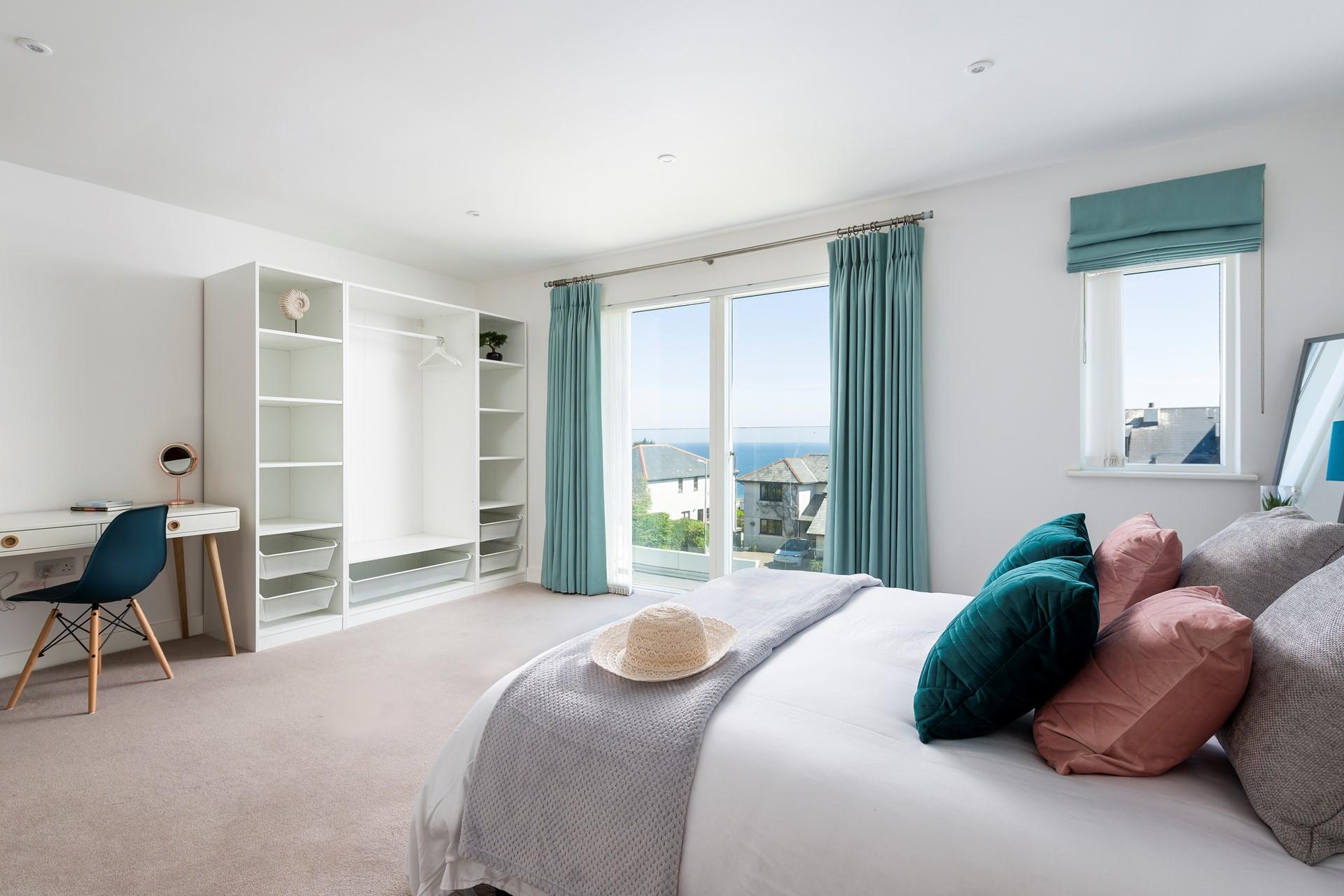 Sink back into the plump cushions and admire the views from the sumptuous king size bed. 