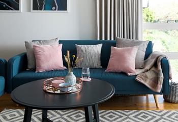 Soft furnishings and decor have been carefully chosen to create an elegant finish throughout the apartment. 