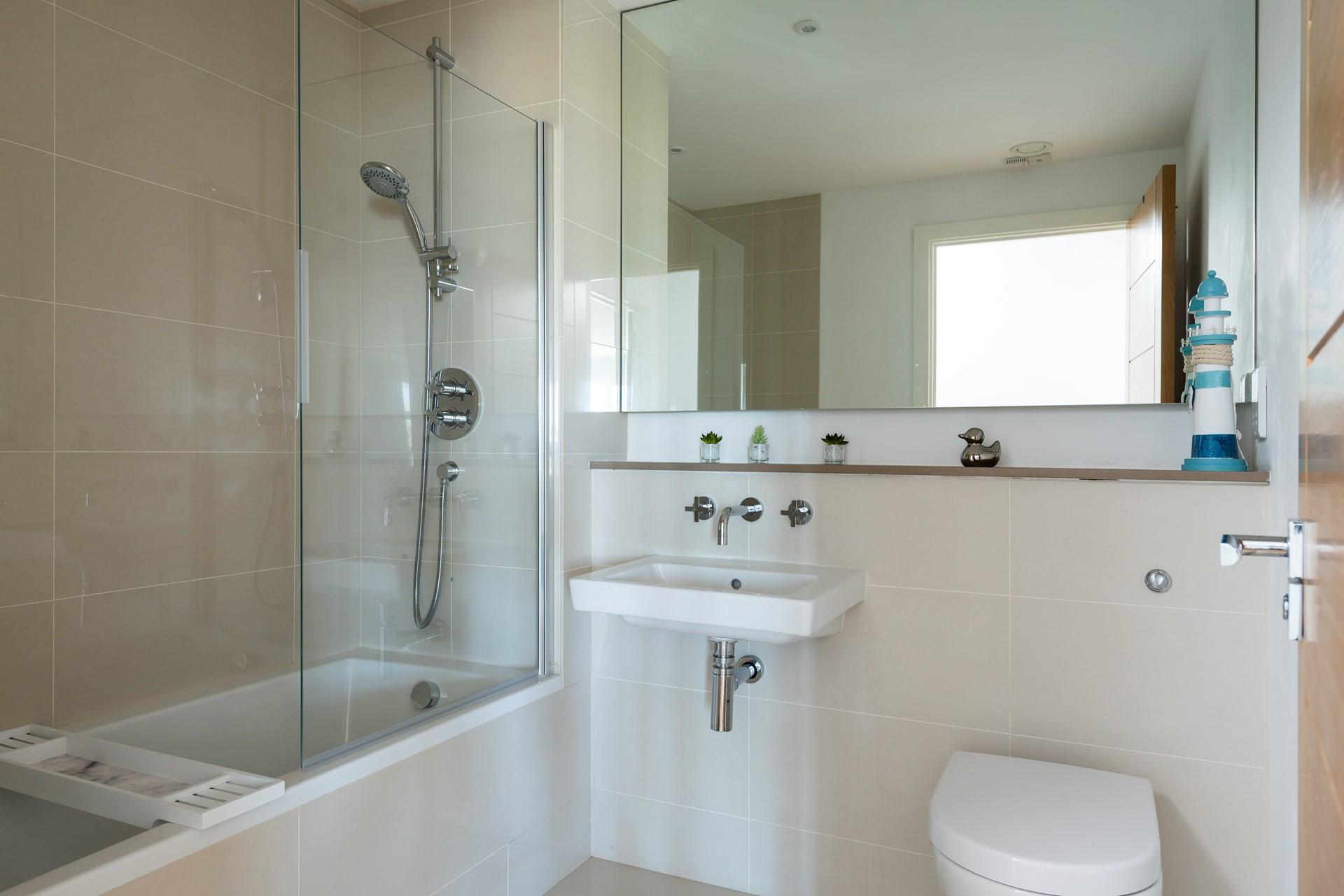 Sink into the bath in the family bathroom after a busy day exploring St Ives. 