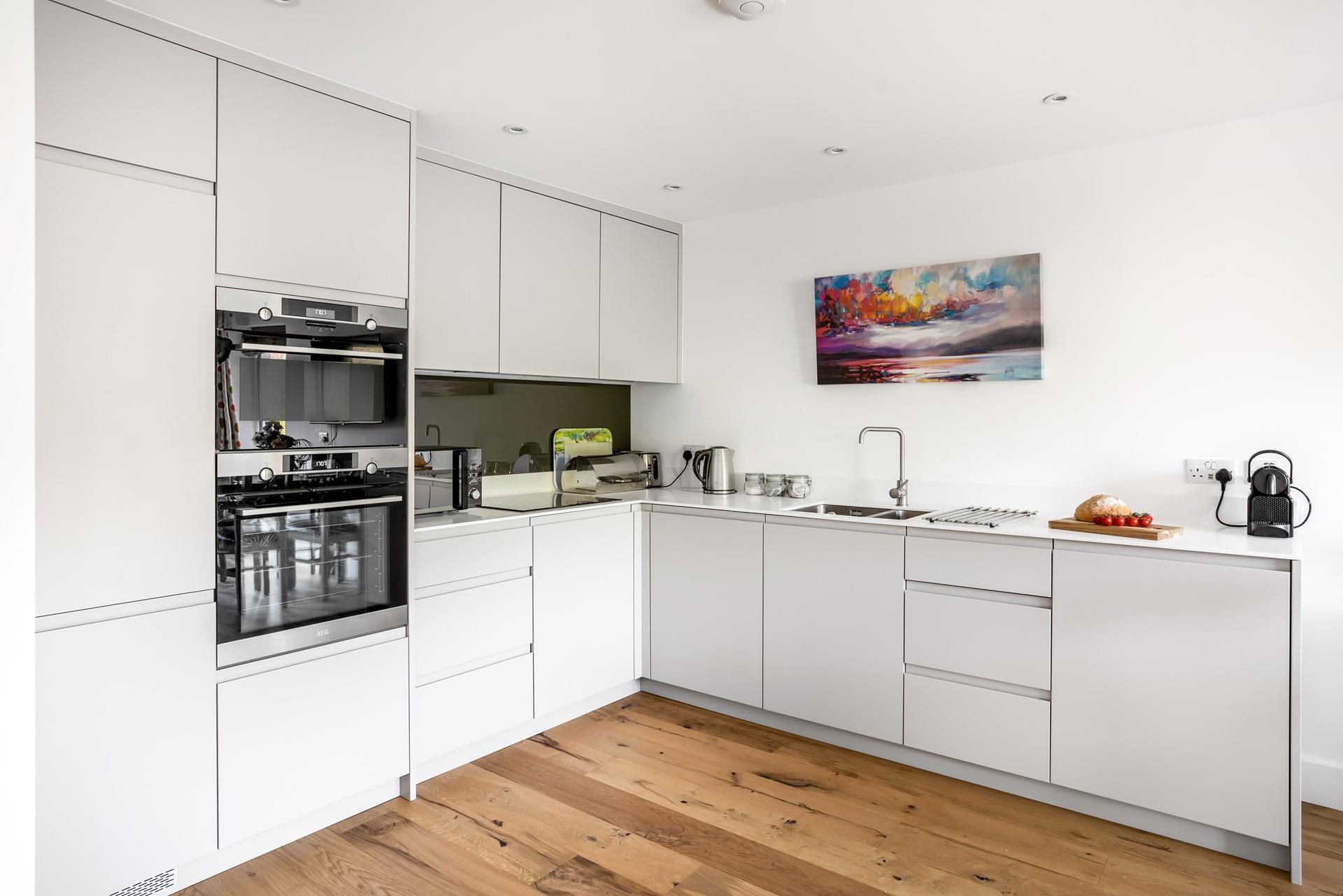 The kitchen is well-equipped for preparing and cooking tasty feasts.
