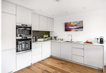 The kitchen is well-equipped for preparing and cooking tasty feasts.