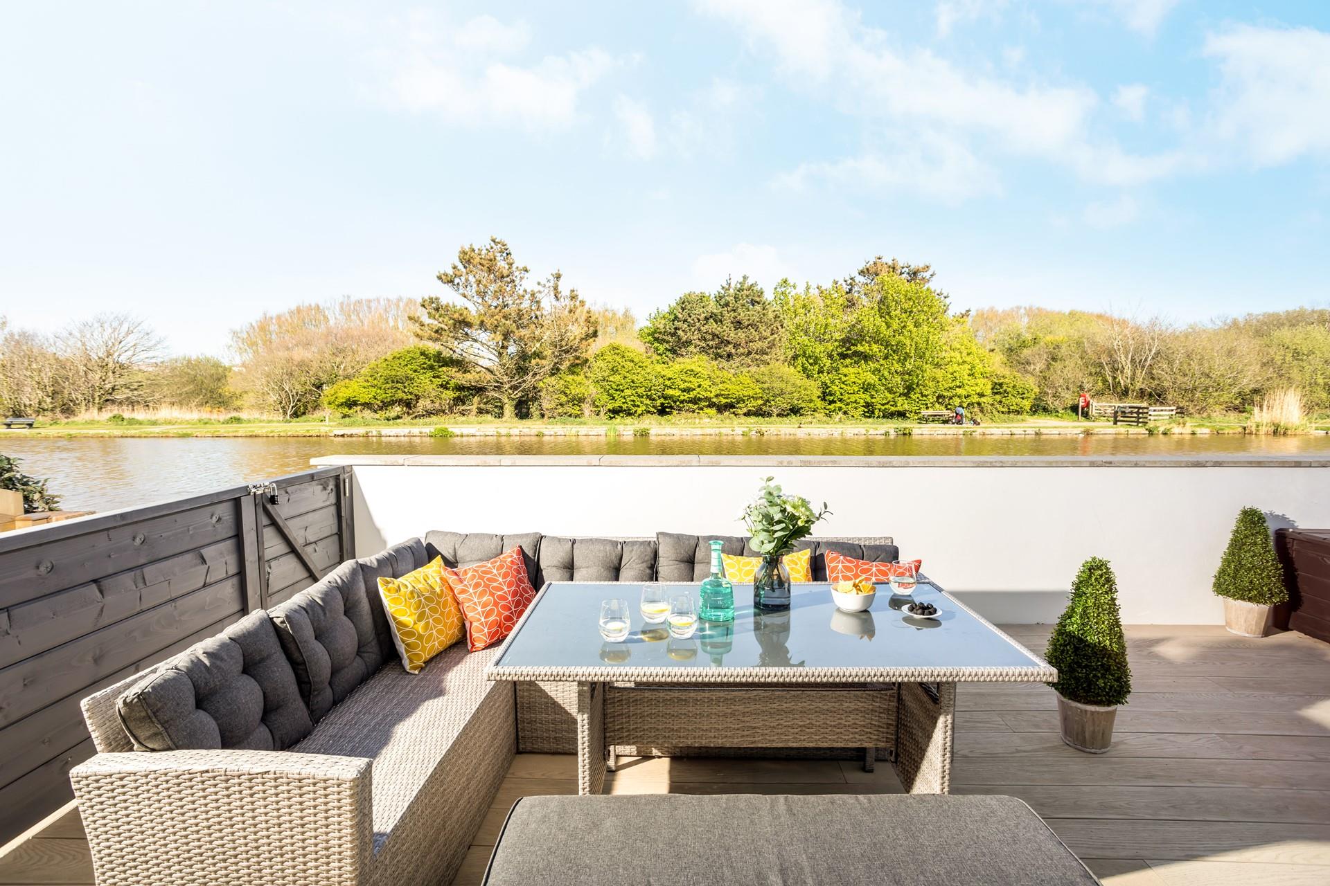 Indulge in drinks and nibbles on the decking area. as the sun comes down.