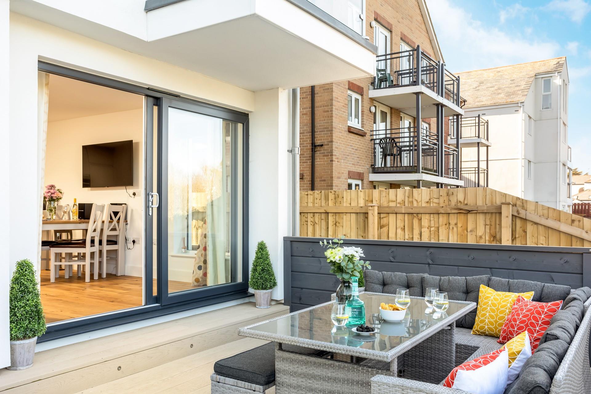 The outside living space is luxurious and provides guests with ultimate comfort and relaxation.