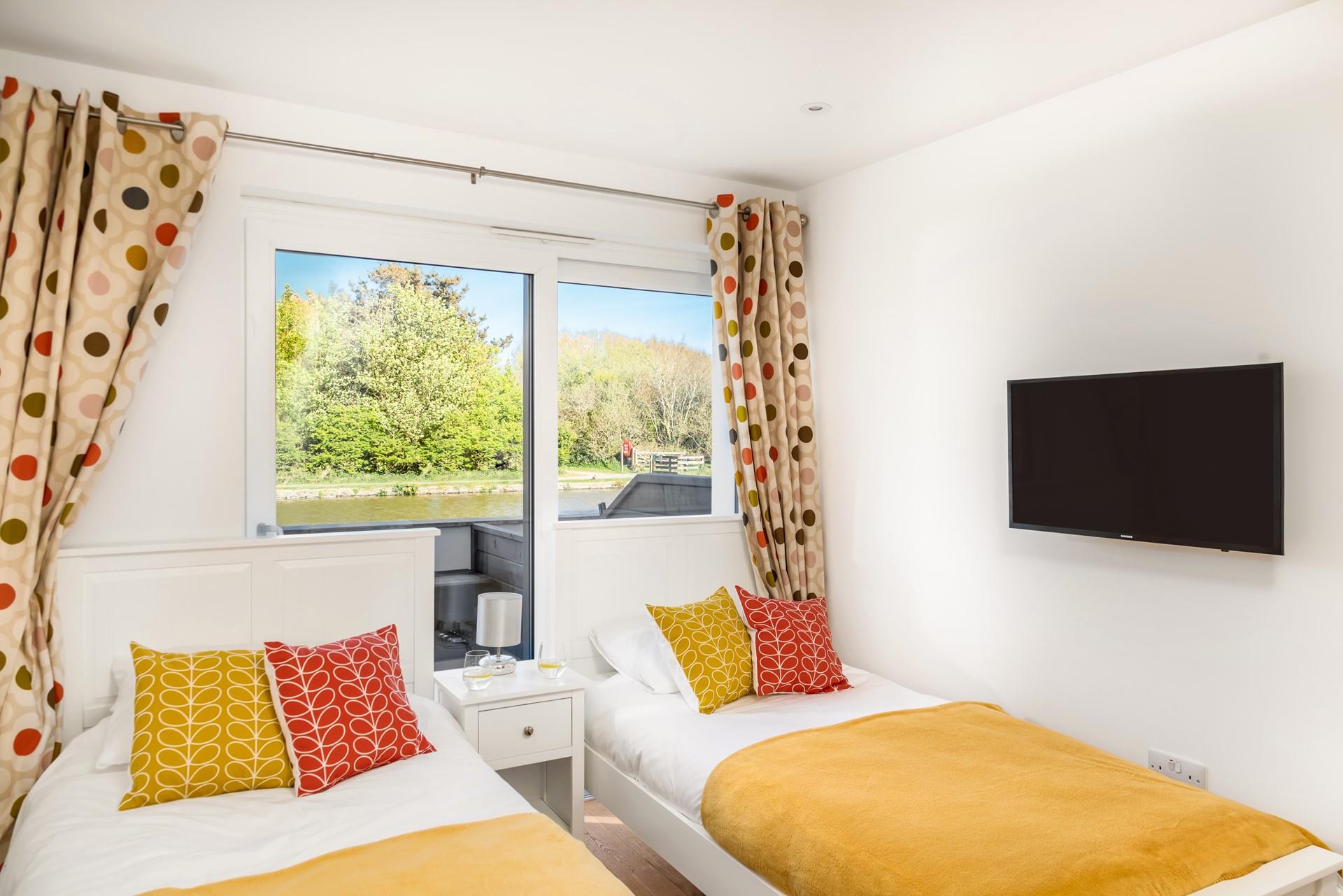 The twin room is bright and colourful, the perfect base to rest your head.