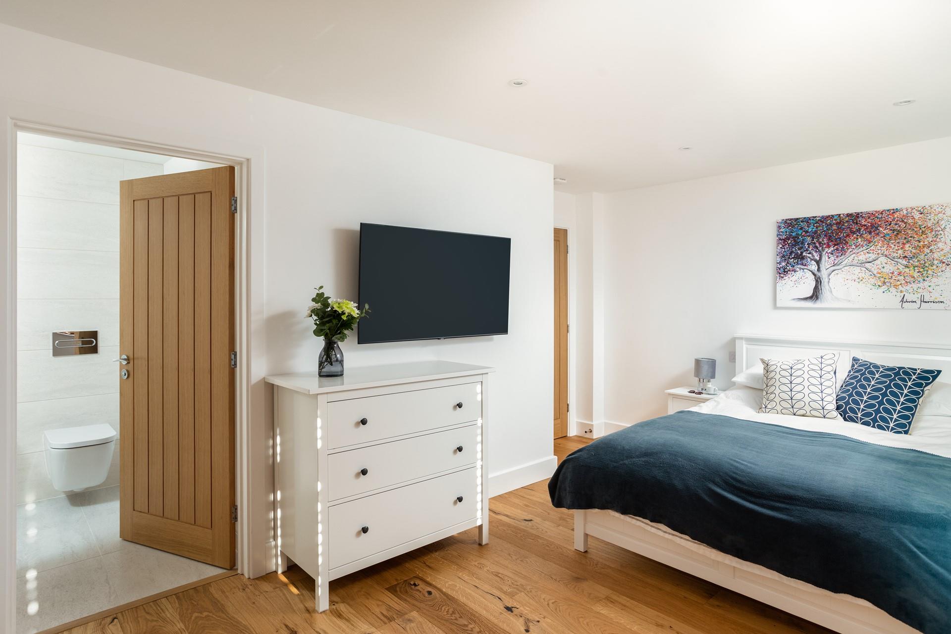 Wake up and wander into the en suite to get ready for the day.