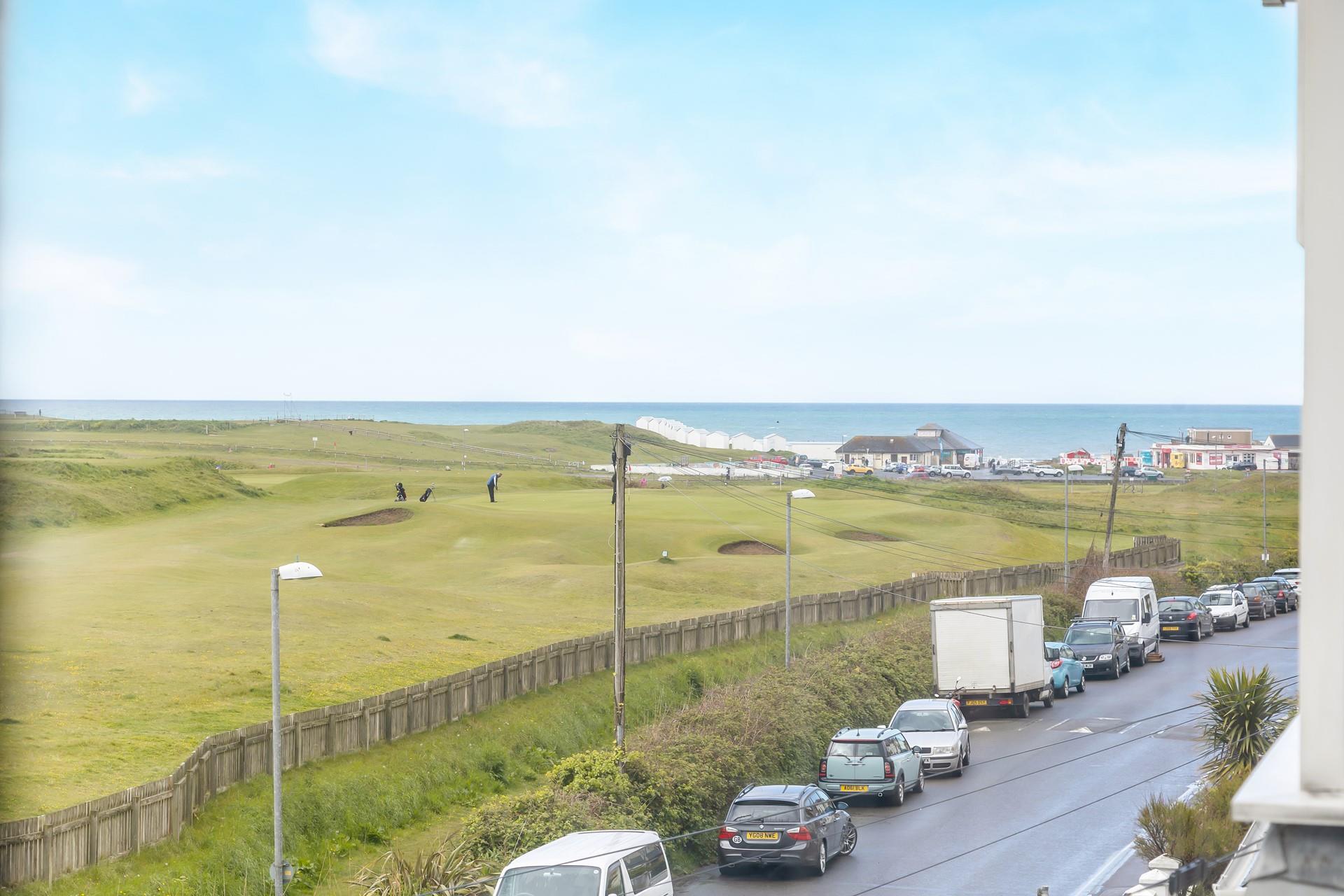 The sea view from the front bedroom overlooks Bude Golf Course and shows the close proximity to the beach.