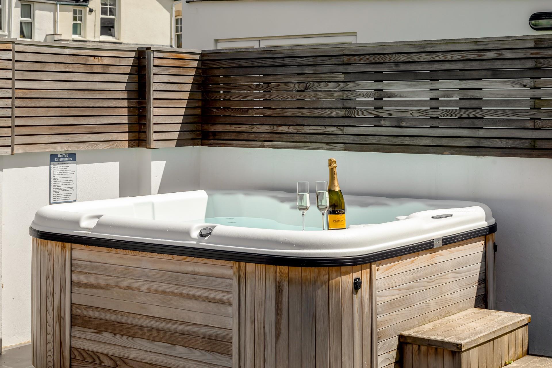 Watch the stars at night as you relax in the bubbles with a glass of prosecco.