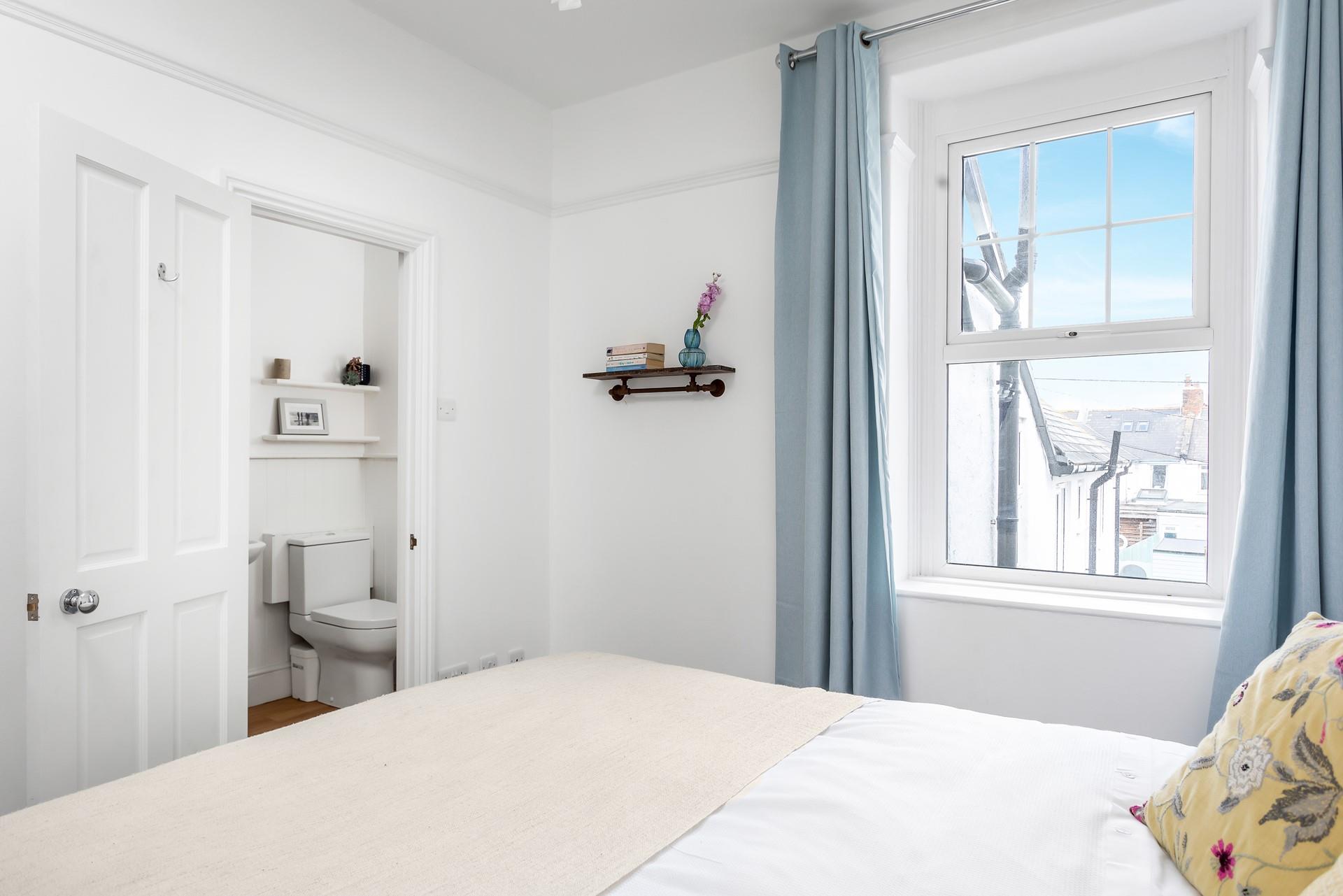 Wake up and wander into the en suite to get ready for the day.