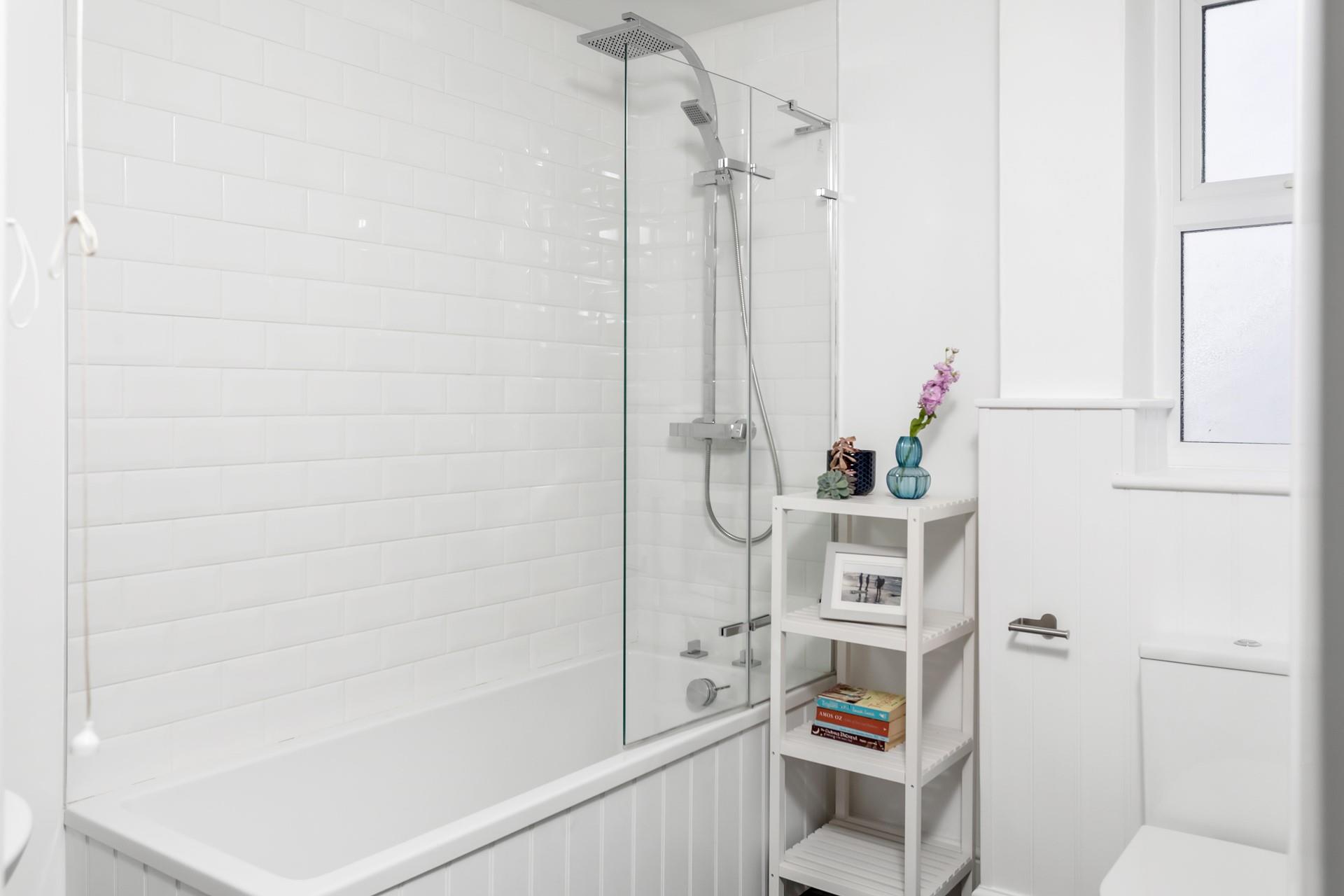 Choose between the rainfall shower or a relaxing bath to end the day.