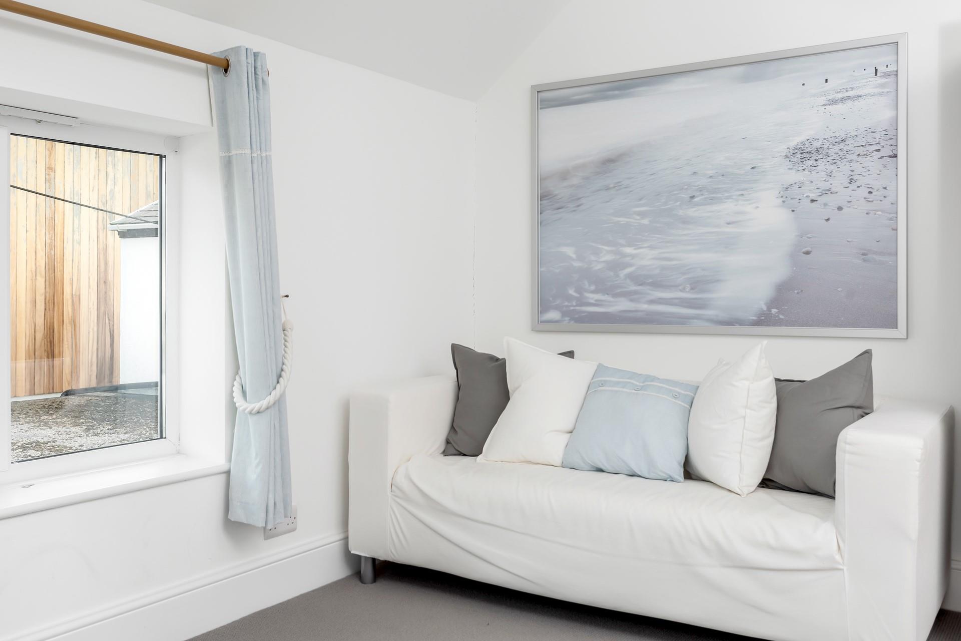 Cool contemporary tones make for a calming space in bedroom 2.