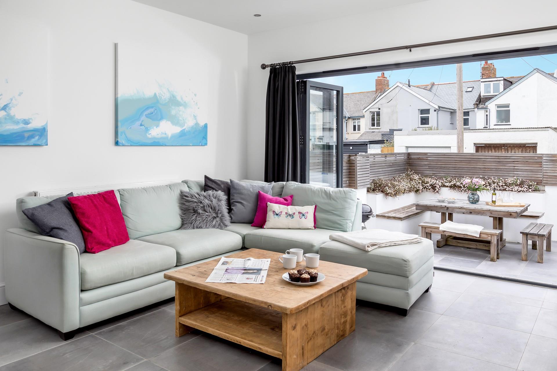 The large bi-fold doors make outdoor living a breeze in the warm summer months.