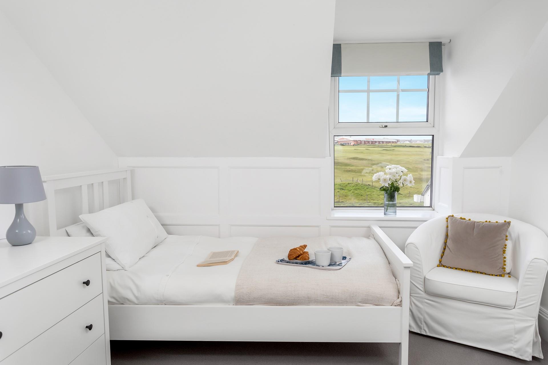 Wake up to views as far as the beautiful blue ocean.