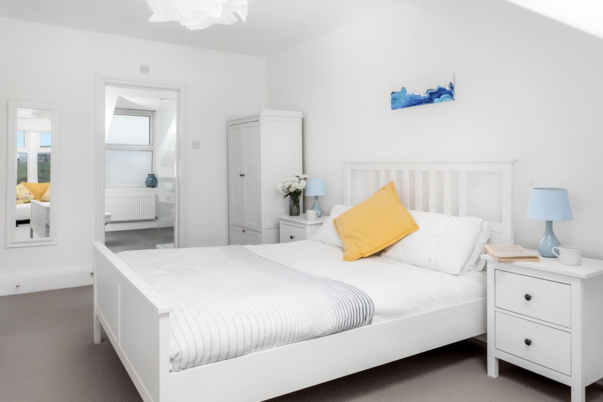 Neutral tones make this the ideal space to relax and unwind from the stresses of daily life.