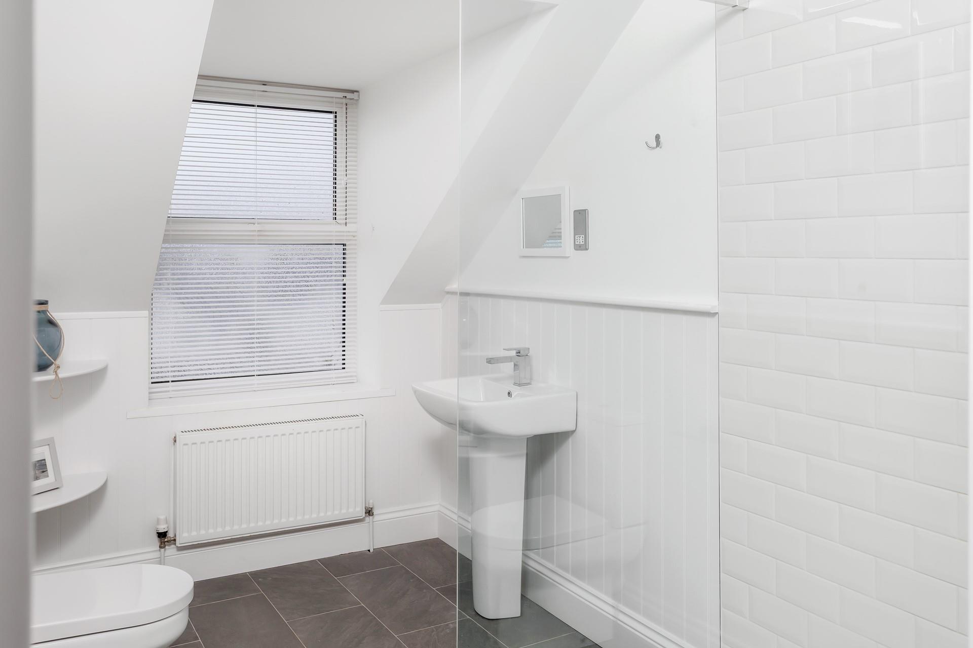 Get ready for the day in the stylish bathroom.