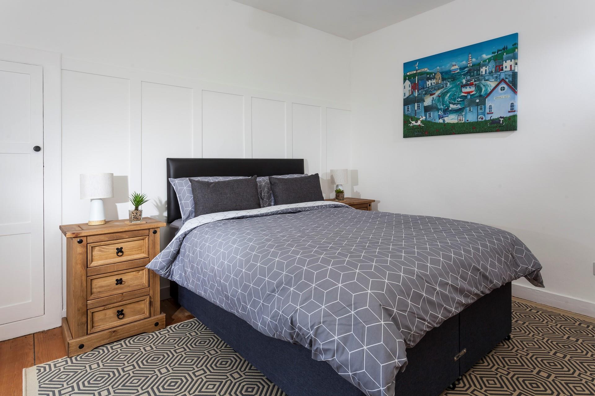 The master bedroom has a double bed for you to drift into a dreamy night's sleep.
