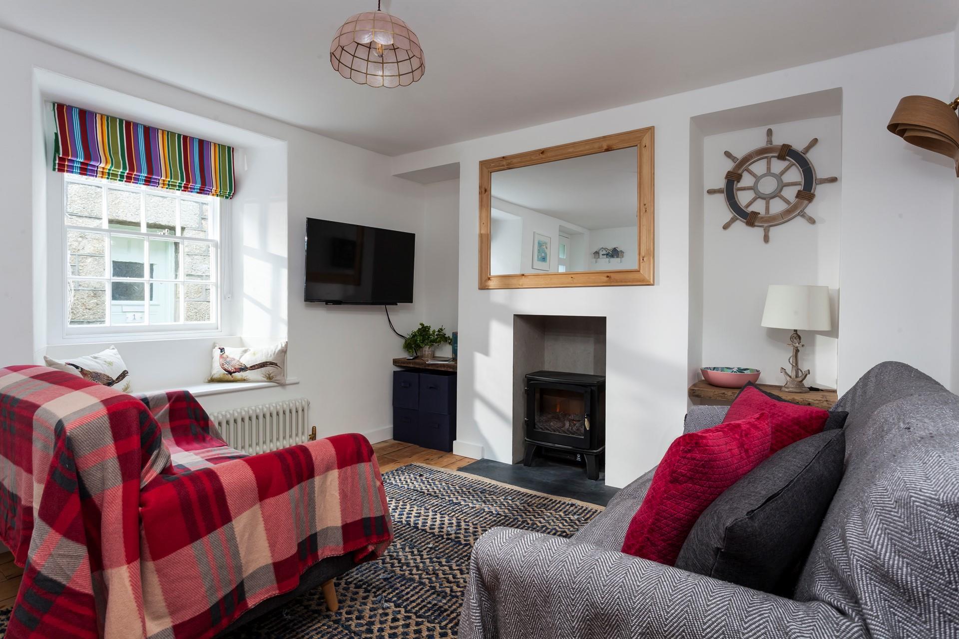 Cosy sitting room with electric "woodburner".