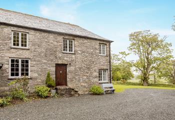 The picturesque cottage is made from traditional granite stone.