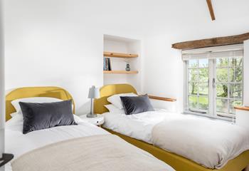 Bedroom 2 has cosy twin beds, wake up to rural views and see what wildlife you can spot.