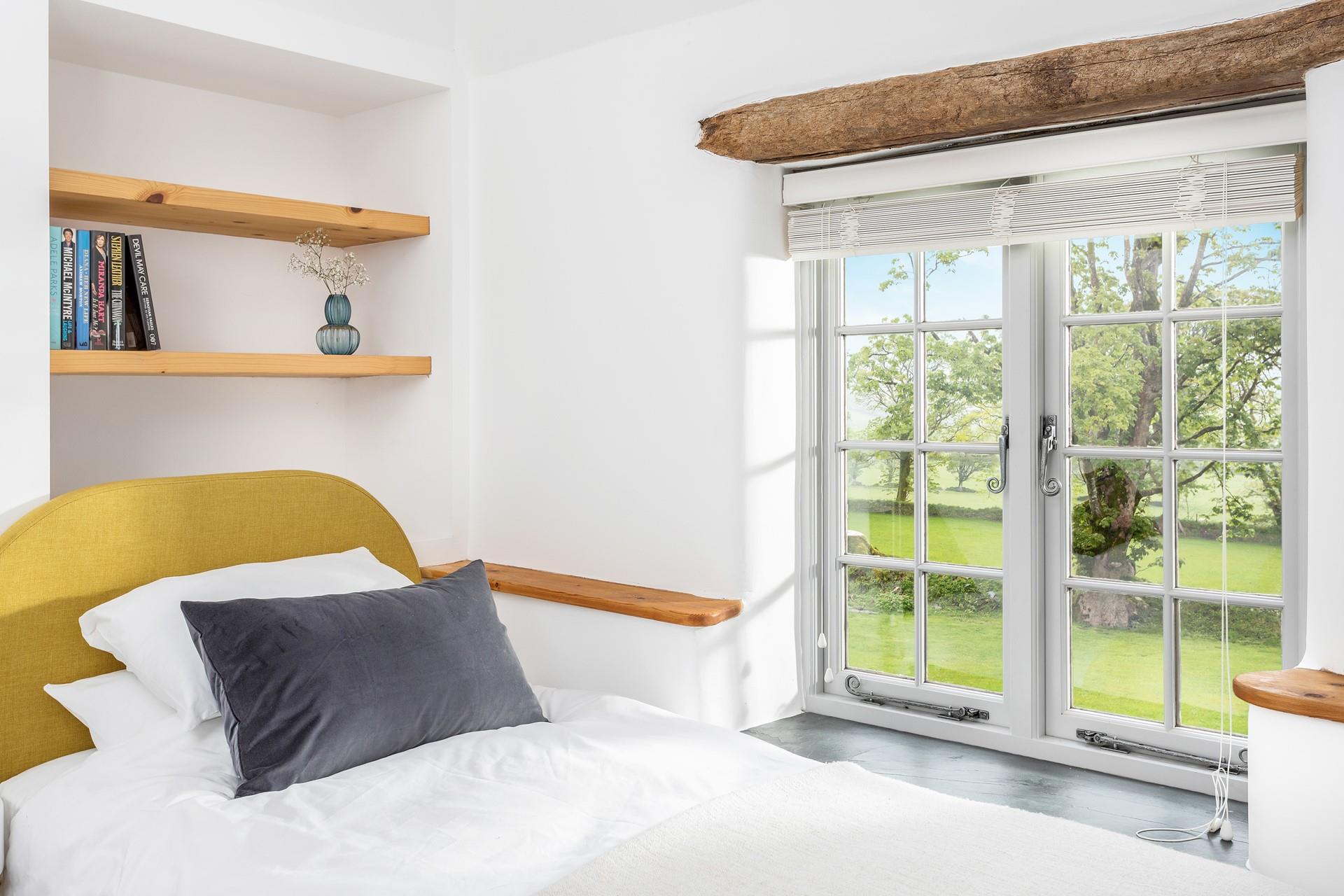 The second bedroom overlooks the beautiful Cornish countryside.