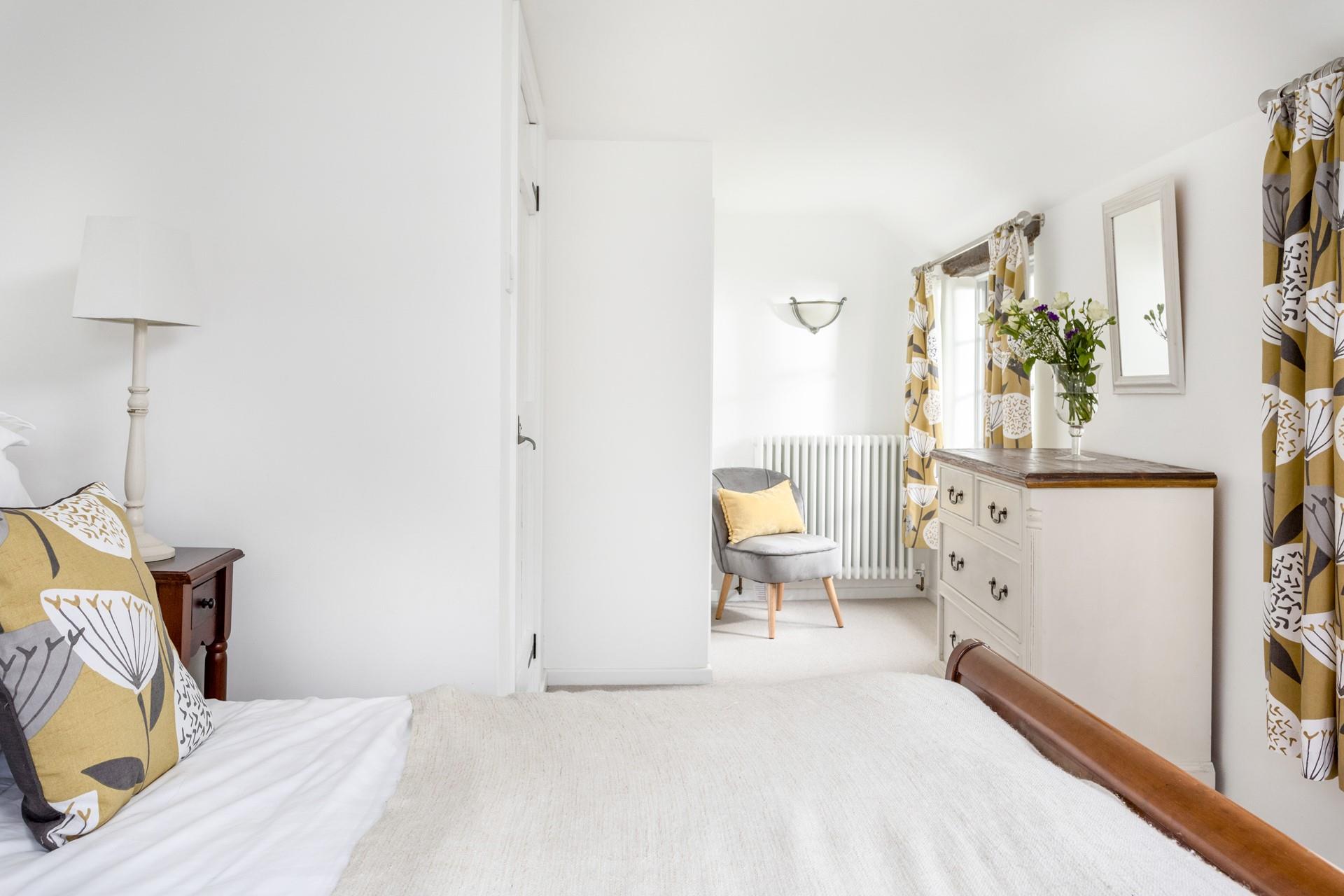 A beautifully relaxing bedroom, where you'll sleep soundly.