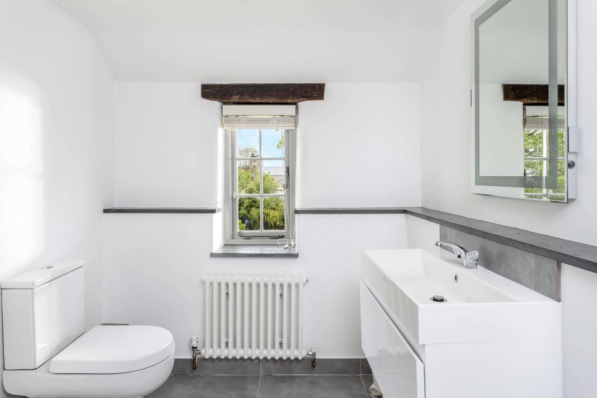 The family bathroom is the perfect space to get ready in the morning.