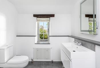 The family bathroom is the perfect space to get ready in the morning.