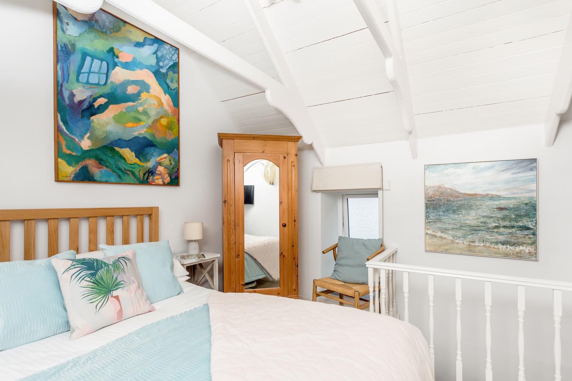 Cosy into bed after a long day exploring the Cornish coast.