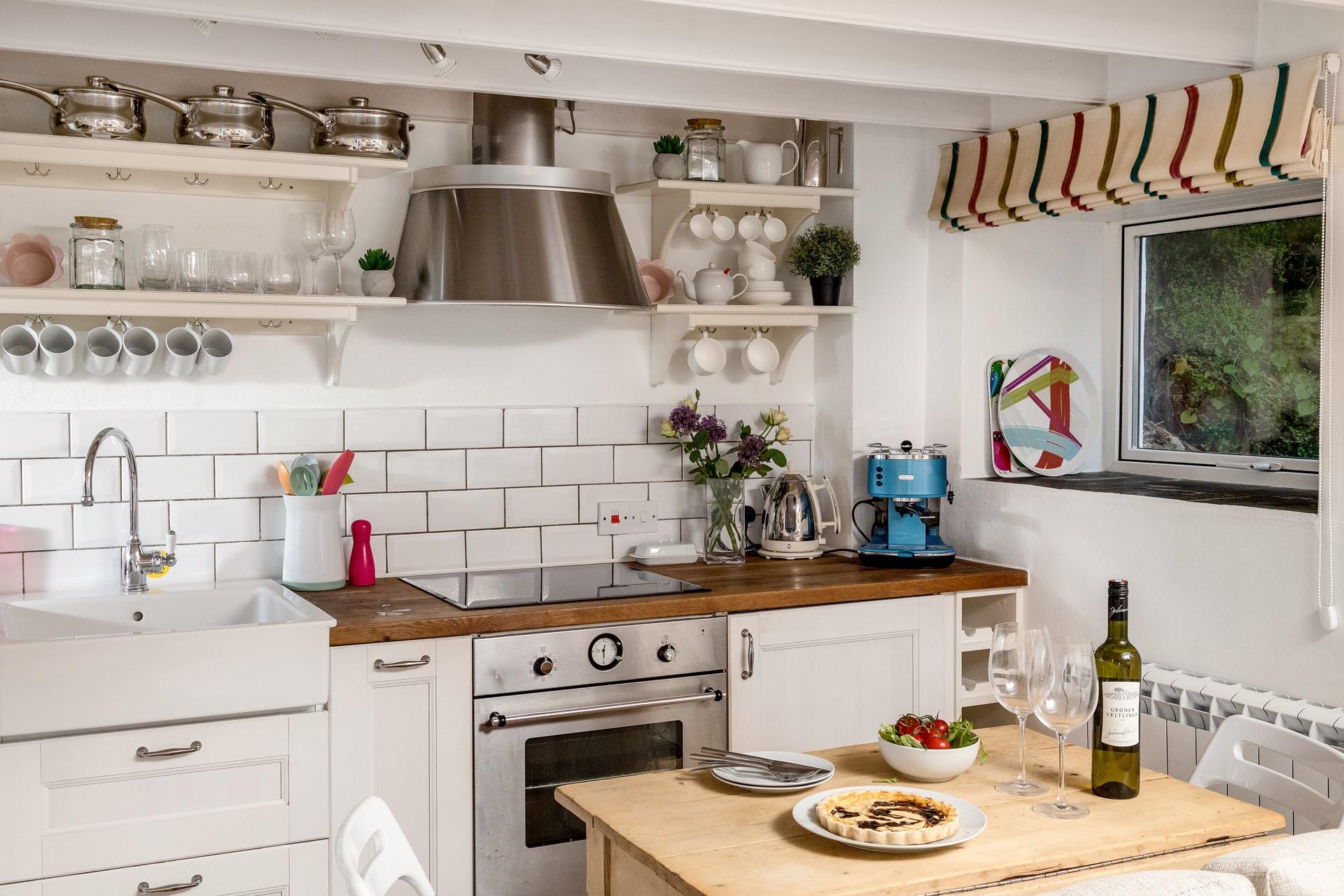 The modern kitchen is well-equipped for all your culinary needs.