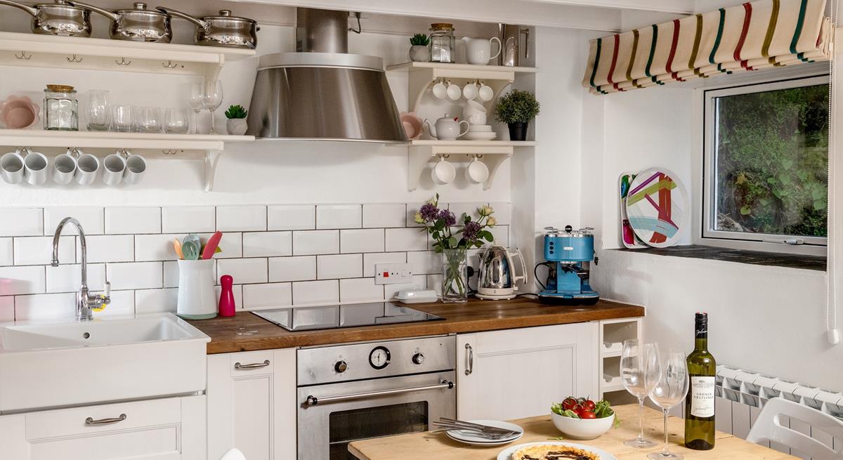 The modern kitchen is well-equipped for all your culinary needs.