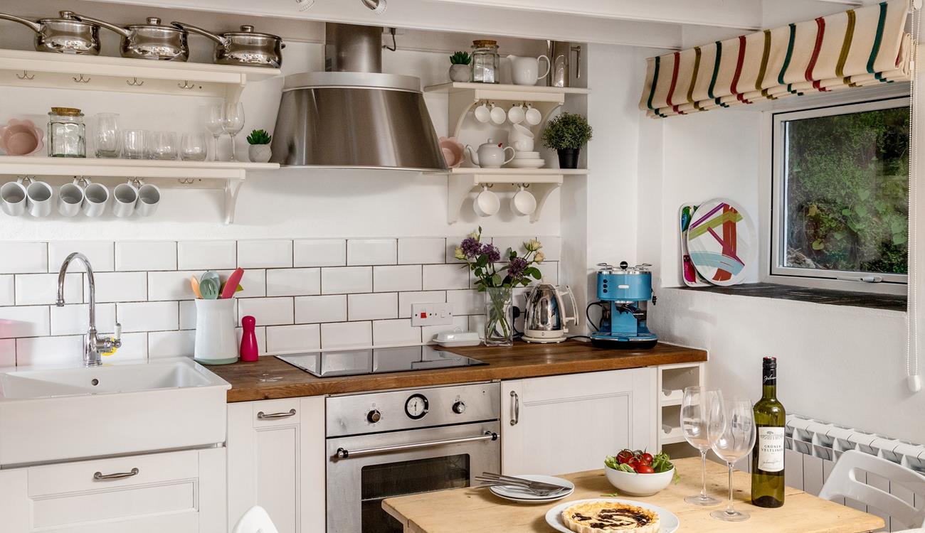 The modern kitchen is well-equipped for all your culinary needs.