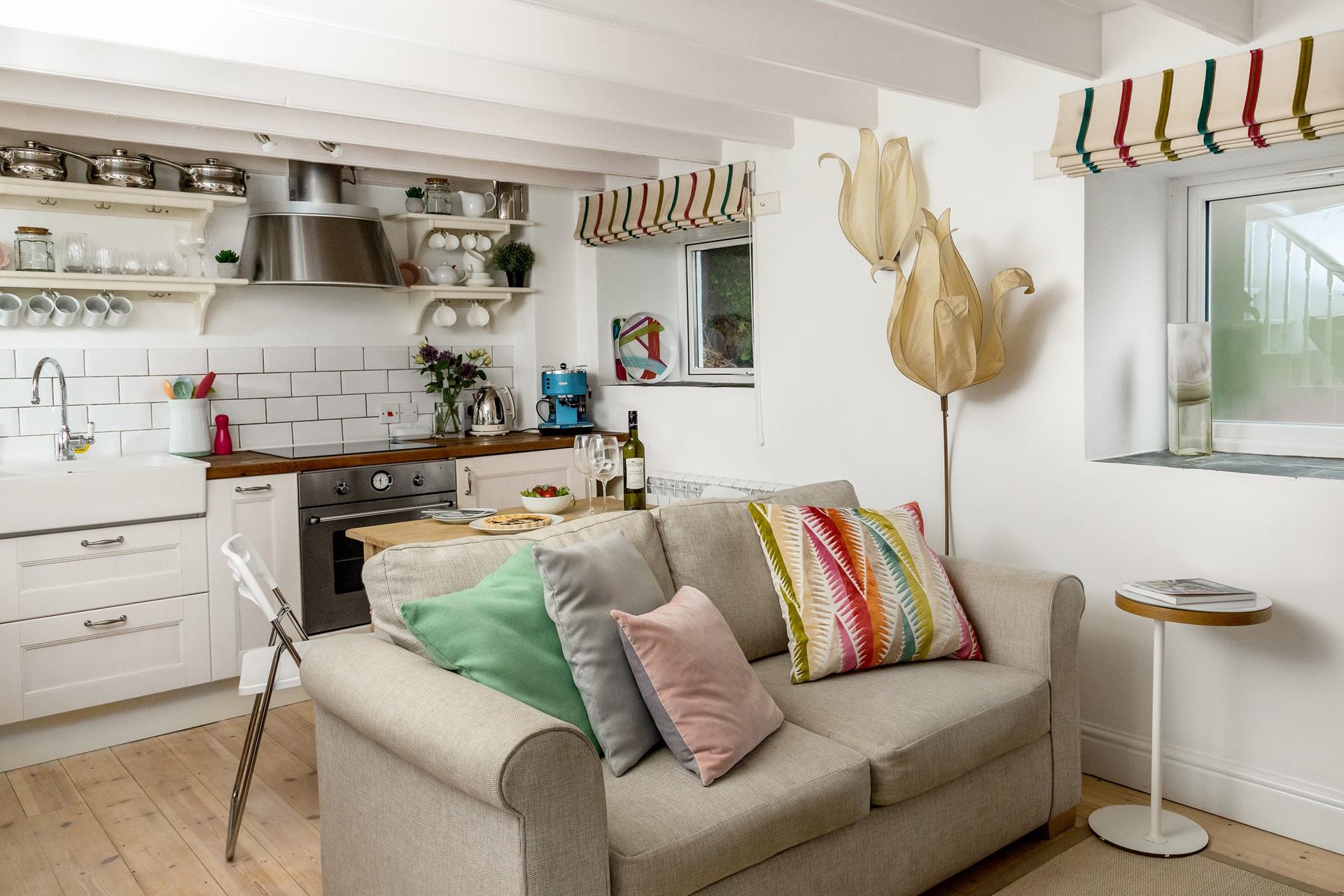 The open plan living space is perfectly equipped to create a base for your romantic getaway.