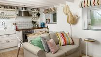 The open plan living space is perfectly equipped to create a base for your romantic getaway.