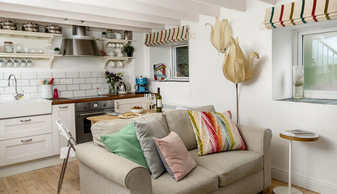 The open plan living space is perfectly equipped to create a base for your romantic getaway.