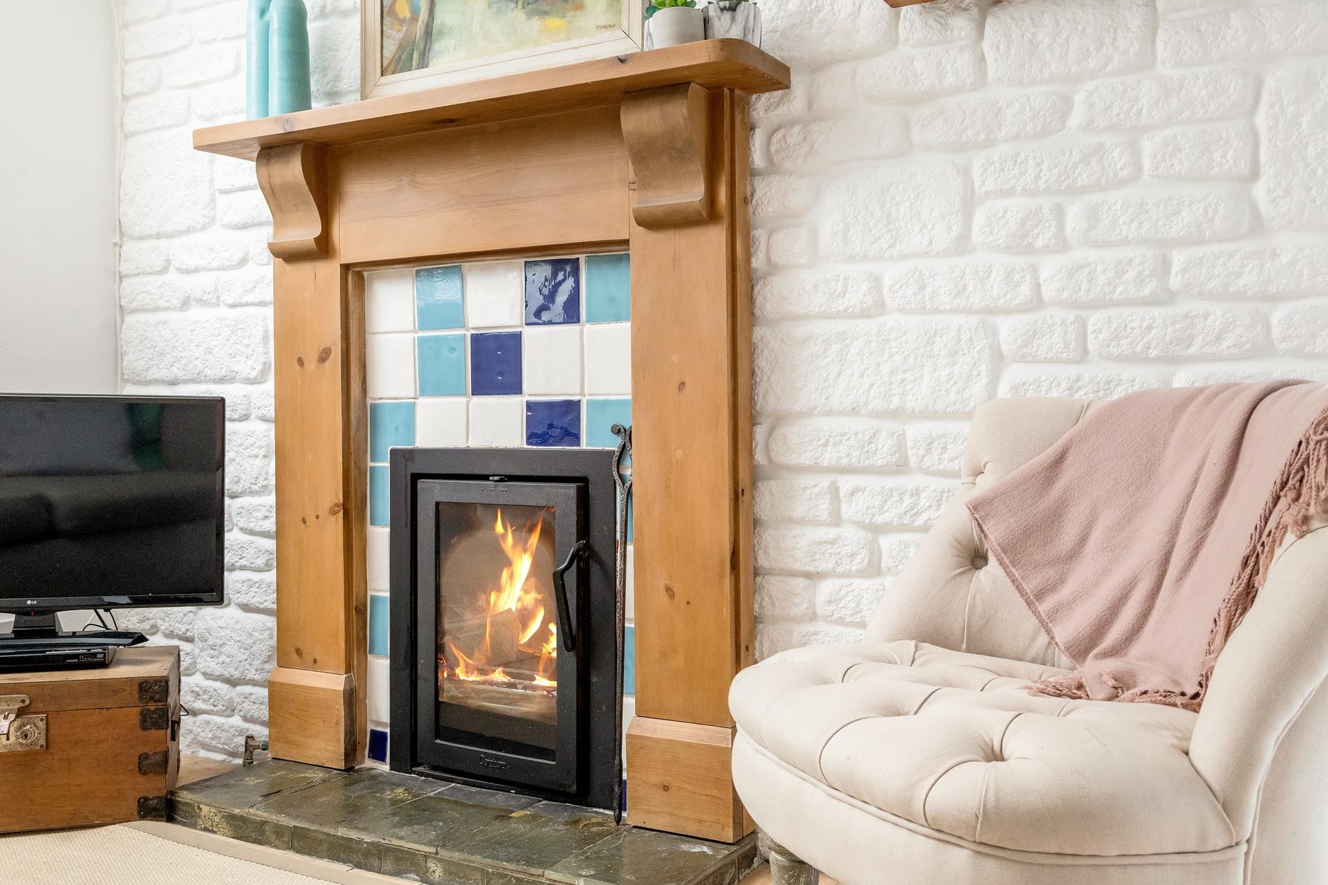 Snuggle up on the sofa listening to the crackling of the woodburner.