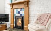 Snuggle up on the sofa listening to the crackling of the woodburner. - Thumbnail Image