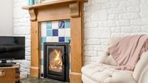 Snuggle up on the sofa listening to the crackling of the woodburner.