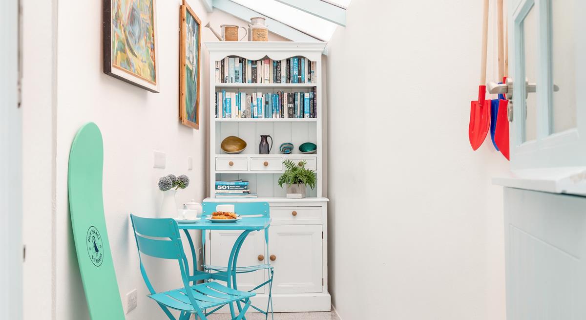 The porch area is an ideal space to store your buckets and spades!